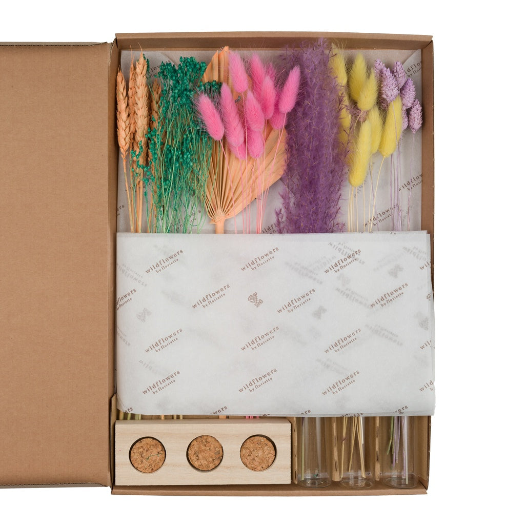 Dried flowers in letterbox with vases