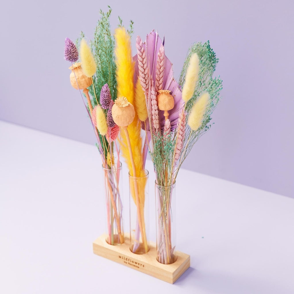 Dried flowers in letterbox with vases